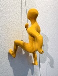 Ancizar Marin Sculptures  Ancizar Marin Sculptures  Male Climber with Left Leg Up (Yellow)