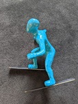 Ancizar Marin Sculptures  Ancizar Marin Sculptures  Cross Country Skier (Teal)