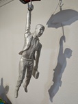 Ancizar Marin Sculptures  Ancizar Marin Sculptures  Umbrella with Businessman (Rainbow Umbrella, White Figure)