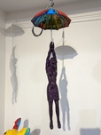 Ancizar Marin Sculptures  Ancizar Marin Sculptures  Umbrella with Business Lady (Rainbow Umbrella, Purple Figure)