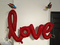 Ancizar Marin Sculptures  Ancizar Marin Sculptures  Love with Hands (Rainbow Swirl and Red)